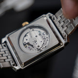 Bulova Classic Sutton Automático Open Heart Bitono 98A308