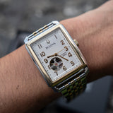 Bulova Classic Sutton Automático Open Heart Bitono 98A308